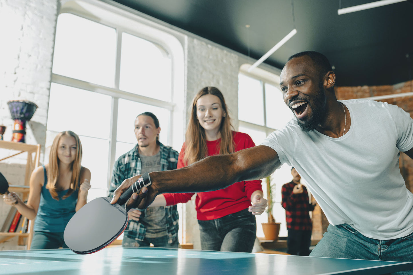 AirBlades Professional Ping Pong Paddle Friends Playing Table Tennis the PeaceMaker